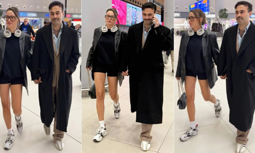 Serenay Sarıkaya ve Mert Demir havalimanında objektiflere takıldı