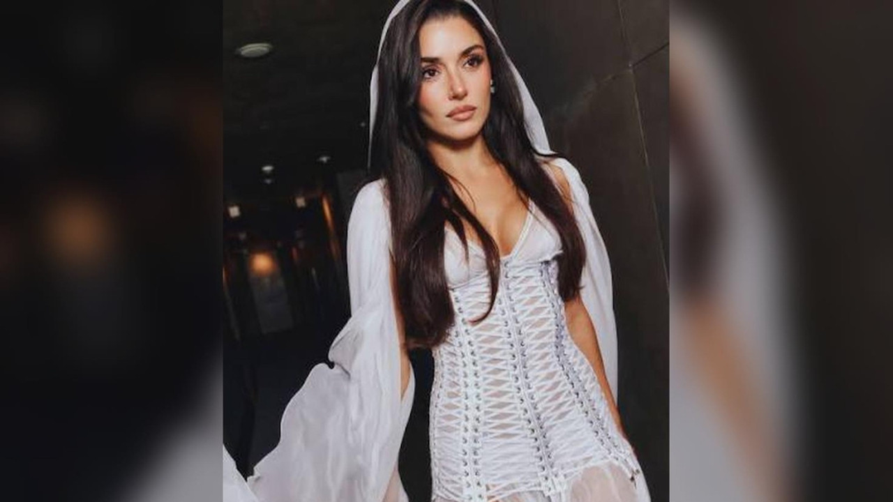 Hande Erçel Milano'da tüm dikkatleri üzerine çekti! Beyaz elbisesiyle gecenin yıldızı oldu